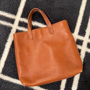 Madewell bag- no tags but never used. Has monogram HL but barely even visible.